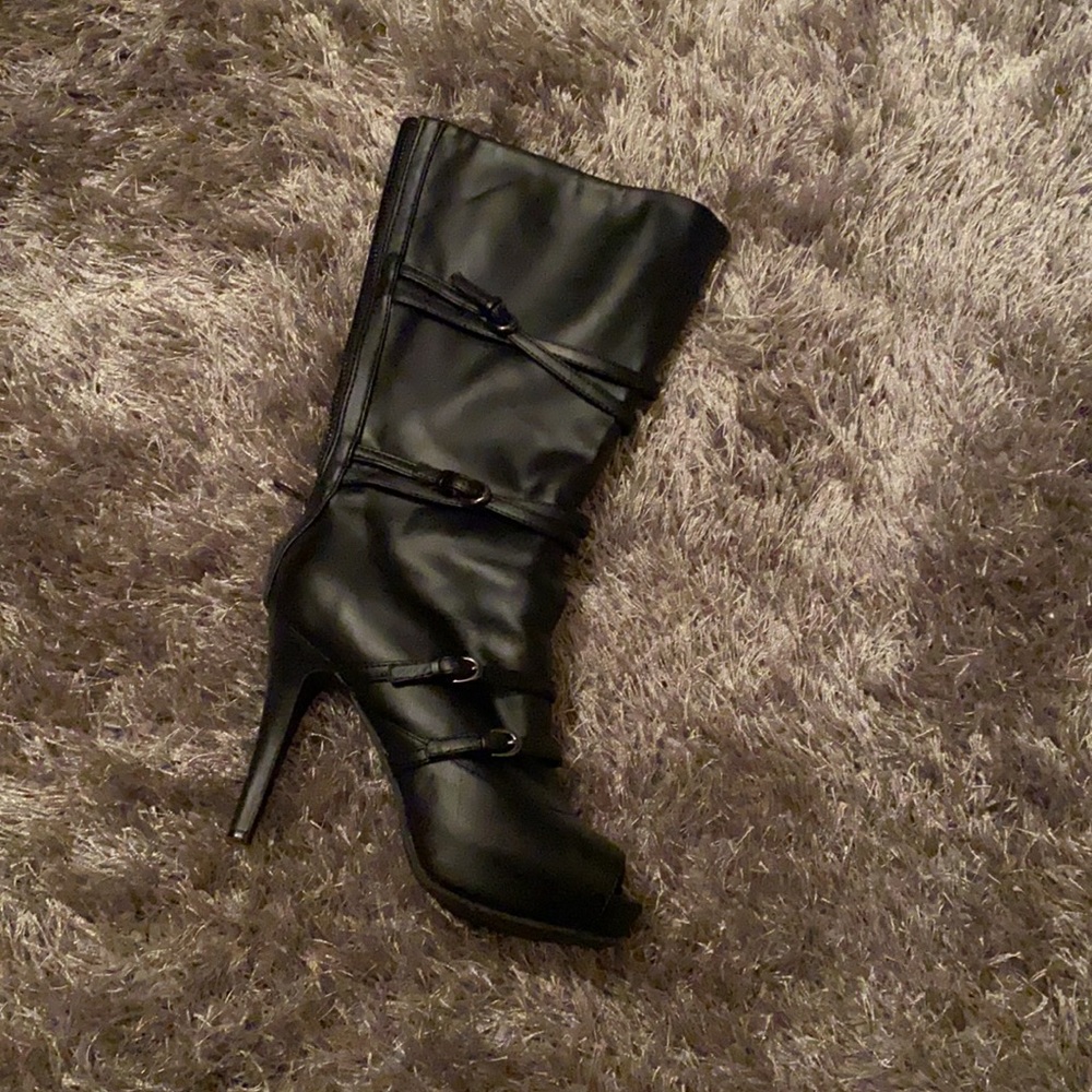 Open toe boots with approximately 4 1/2 inch heels.